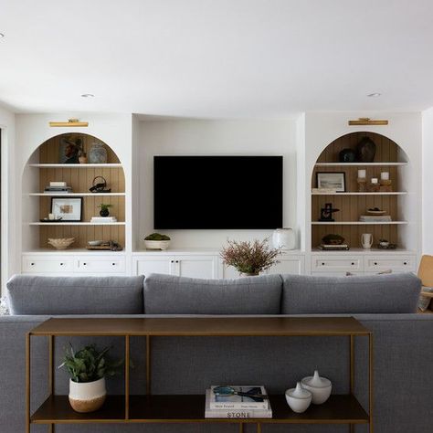 Bright and airy living room design Living Room Tv Not Focal Point, Media Room Cabinet Ideas, Built In Media Wall Basement, Amber Interiors Tv Room, Media Wall Built In Ideas, Media Console Built In, Large Tv Built In, Built In Tv Console Ideas, Built In Shelves Tv Wall