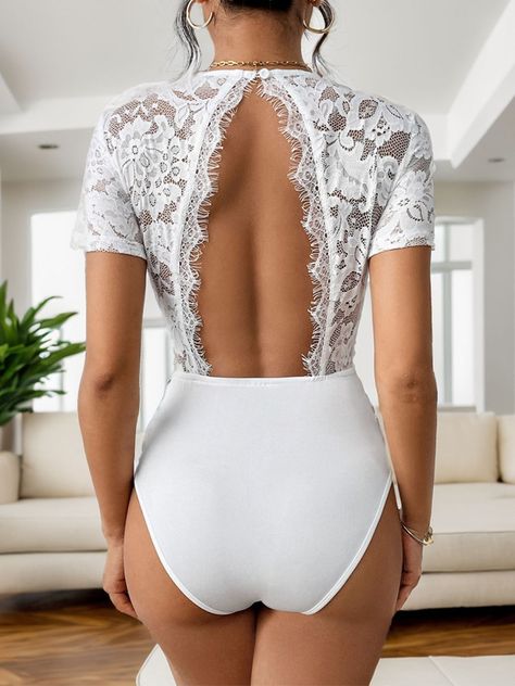 Cutout V-Neck Short Sleeve Lace Bodysuit 🌟 Turn heads in our exquisite Cutout V-Neck Lace Bodysuit! 🌺 Luxuriously soft, 95% polyester, 5% elastane with moderate stretch to hug your curves perfectly. Semi-sheer lace adds a dash of mystery! 😍 Sizes S-XL. Care is a breeze: machine wash cold, tumble low. 🇺🇸 FREE shipping across the US! Snag yours and flaunt your style! 💃 #FashionTrend #LaceLove #FreeShipping https://belongandbe.com/products/cutout-v-neck-short-sleeve-lace-bodysuit Instagram Cutout, Swimsuit Collection, Crop Top Bra, Maxi Dress Cocktail, Swimwear Cover Ups, Maxi Dresses Casual, Swimwear Cover, Lace Bodysuit, Skirted Swimwear