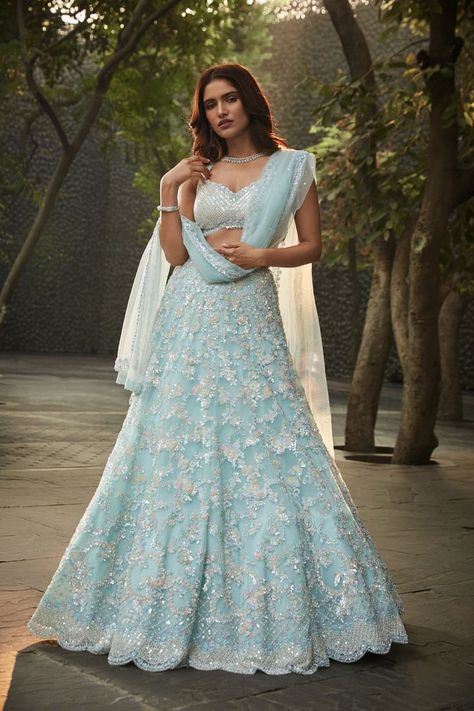 Get your diva mood on with this stunning sequin embroidered pastel blue Lehenga Set Book your appointment to view our bridal collection at Www.nalacouture.com Or Call 0787 2534426 Blue Georgette Lehenga, Light Blue Lehenga, Sky Blue Lehenga, Gold Lehenga, Resham Embroidery, Georgette Lehenga, Organza Lehenga, Lehenga Designs Simple, Traditional Indian Dress