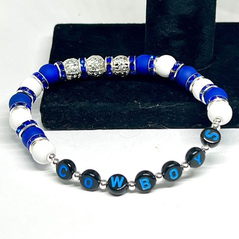 Experience awesomeness! Introducing Dallas Cowboy Football Bead Bracelets - Handcrafted Fan Accessories, available now at an amazing price of $10.00 #SportsJewelry #DallasCowboys #AcrylicBeads #StretchyBeads #SilverFiligreeBead #PolymerClayBeads #TeamSpirit #BlueWhiteSilver #TexasBracelets #FashionJewelry Cowboy Football, Dallas Cowboy, Sports Jewelry, Dallas Cowboys Football, Fan Accessories, Cowboys Football, Bead Bracelets, Polymer Clay Beads, Silver Filigree