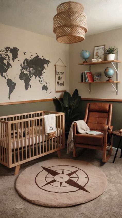 Travel-themed baby boy nursery with a world map mural, globes, and compass rug. Nursery Ideas Travel Theme, Leather Nursery Chair, Little Explorer Nursery, National Parks Nursery Theme, National Park Nursery Theme, Map Themed Nursery, Atlas Nursery, Travel Baby Room, Travel Nursery Theme