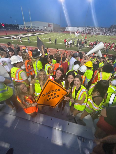 Construction Fb Game, Pool Party Themed Football Game, Construction Worker Football Theme, Black Out Fits For Football Games, Construction Zone Football Theme, School Spirit Football Games, Neon Poster Ideas, Cheer Squad Ideas, Hawiann Theme Football Games