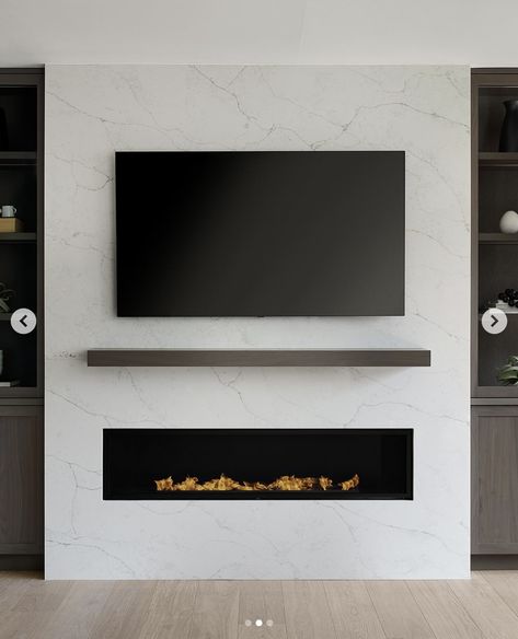 25 Practical Yet Beautiful Electric Fireplace With TV Above Ideas Foyer Tv Mural, Bedroom Tv Fireplace Wall, Tv Above Fireplace Ideas Living Rooms, Tv Over Gas Fireplace, Tv Beside Fireplace Ideas, Electric Fireplace With Tv Above, Electric Fireplace With Tv, Luxurious Living Room Ideas, Tv Unit Table