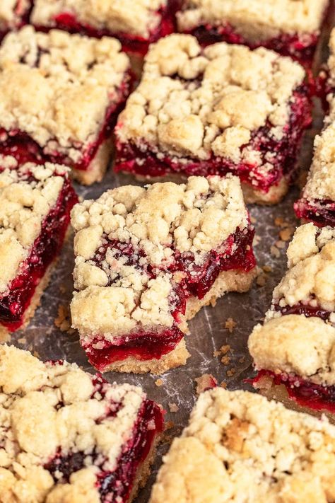 Cranberry Bars are buttery brown sugar cake bars with fresh cranberry filling. A Christmas treat that you can easily make all year round. Cranberry Bars Recipe, Cranberry Recipes Dessert, Fresh Cranberry Recipes, Raspberry Crumble Bars, Cake Bars Recipe, Cranberry Bars, Cranberry Dessert, Raspberry Crumble, Crumb Bars