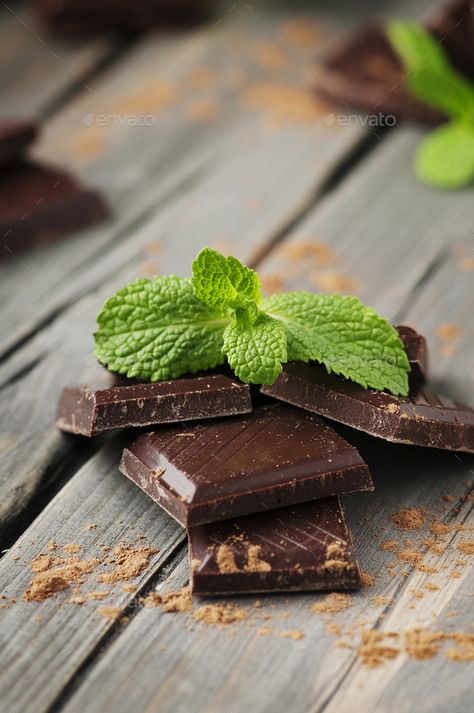 Dark chocolate with mint on the vintage table by OxanaDenezhkina. Dark chocolate with mint on the vintage table, selective focus #Sponsored #mint, #vintage, #Dark, #chocolate National Celebration Days, Brown Candy, Coffee Advertising, Dark Chocolate Mint, Candy Chocolate, Green Mint, Background Black, Mint Chocolate, Wooden Table