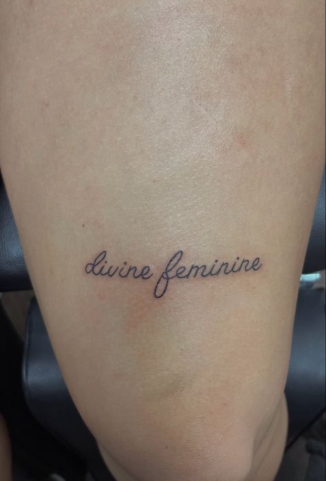 Divine Feminine Tattoo Above Knee, Divine Feminine Knee Tattoo, Cute Knee Tattoos Women, Small Knee Tattoo, Quad Tattoo Women, Above Knee Tattoo Words, Upper Knee Tattoo Women, Above The Knee Tattoos Women, Above Knee Tattoos Women