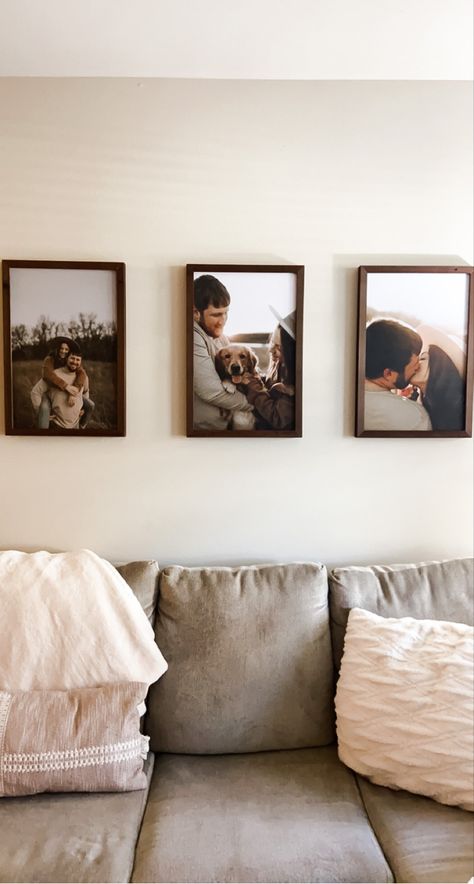 Picture Wall Ideas Couple, Bedroom Decor With Wedding Pictures, Canvas Photos Above Couch, Wedding Photo Gallery Wall Living Room, Couple Photo Wall Decor, Portrait Decor Living Rooms, Couples Gallery Wall, Canvas On Wall Ideas Living Room, Family Photo Wall Over Couch