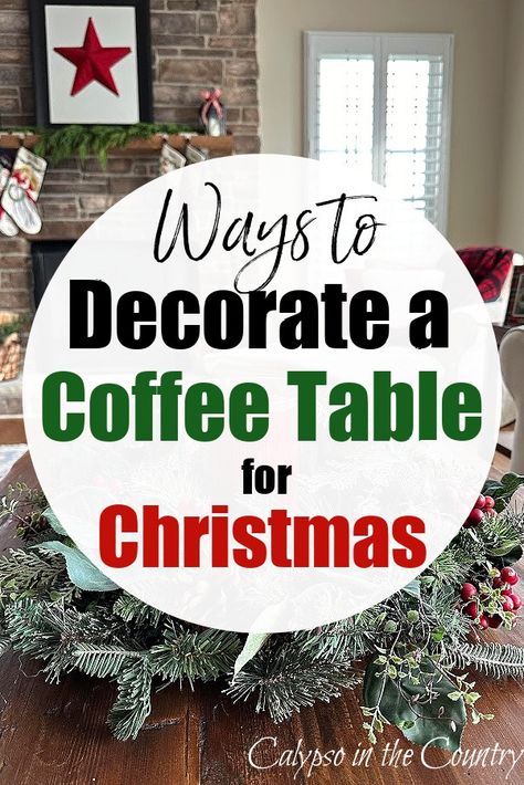 Coffee table with wreath in family room with stone fireplace. Wreath Table Decor, Decorate A Tray On Table, Christmas Sitting Room Ideas, Bowl On Coffee Table Decor, How To Organize Pillows On Couch, Christmas Ideas For Table Decorations, Deco Christmas Table, Decorating Tables For Christmas, Round Table Christmas Decor Ideas