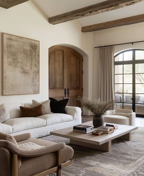 Rustic elegance meets modern comfort. This living room seamlessly combines rustic charm with modern elegance. The exposed wooden beams and earthy tones create a warm, inviting atmosphere, while the minimalist furniture and decor add a touch of contemporary sophistication. The trick to achieving a balanced rustic-modern look? Blend natural materials like wood and stone with clean-lined furniture and neutral colour palettes. What do you love most about this style fusion? Let us know in the c... European Living Room, Wooden Living Room, Modern Rustic Homes, Aesthetic Living Room, Interior Design Rustic, H Design, Minimalist Furniture, Wooden Beams, More Design