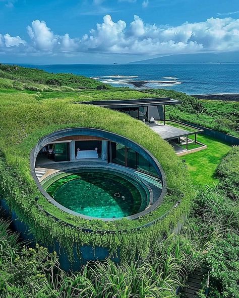 Jima House represents a paradigm shift in contemporary architectural discourse, marrying advanced design principles with a profound respect for the natural environment. Situated atop the rugged cliffs of Iwo Jima, this conceptual residence embodies the ethos of organic architecture, redefining spatial relationships and materiality. #architecture #house #interiordesigner #decor #diy #homedecor #amazingarchitecture #interiordesign #contemporaryhome #modern #residence #designer #home #garden Biotecture Architecture, Earth Integrated House, Earthship Home Exterior, Organic Modern Architecture, Modern House In Nature, Materiality Architecture, Eco Friendly House Architecture, Iceland Architecture, Organic House Design