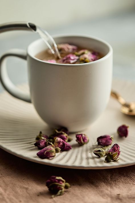 Calming and aromatic, rosebud tea offers a delicate fragrance that instantly relaxes the mind and soul. These high-quality rosebuds can be brewed as a hot or cold floral tea, added to other teas as a flavor enhancement, or used as an accent for mocktails and baked goods.  Brewing instructions: Pour boiling water over 4-5 flowers. Steep for 3 minutes and enjoy. Herbal Tea Photography, Mobile Coffee Shop, Tea Brewer, Tea And Books, Tea Brands, Single Origin, Rose Tea, Floral Tea, Flower Tea