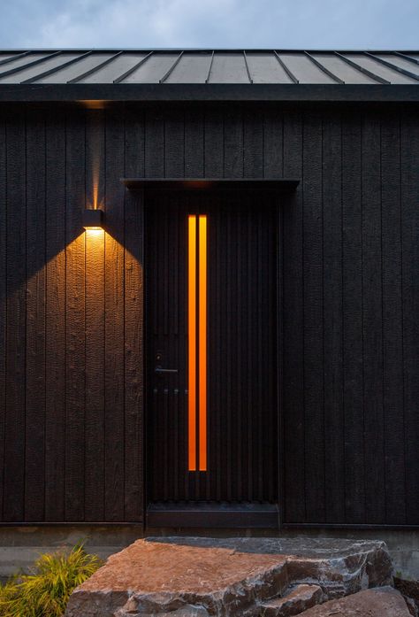 Suyaki™ shining in the evening night on the Boathouse ADU. Architect: SHED Architecture Photographer: Rafael Soldi Burnt Timber Cladding, Cedar Siding Exterior, Shou Sugi Ban House, Exterior Door Trim, Burnt Timber, Black Cabin, The Boathouse, Backyard Studio, Black Barn