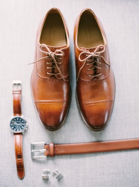 Brown leather groom's accessories: http://www.stylemepretty.com/2015/08/11/romantic-calgary-lake-house-wedding/ | Photography: Milton - http://milton-photography.com/ Lake House Wedding, Groom Accessories, Groom Shoes, Groom And Groomsmen Attire, Brown Dress Shoes, Leather Wedding, Brown Shoes, Groom Attire, Blush And Gold