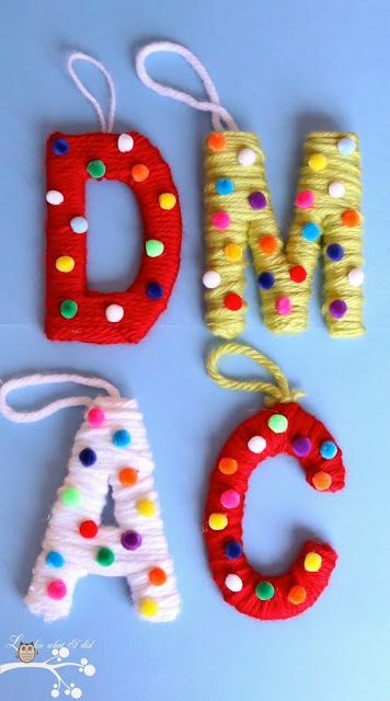 Yarn christmas ornaments diy craft http://www.designdazzle.com/2013/12/yarn-and-pom-pom-monogrammed-ornament/ Yarn Ornaments, Easy Yarn Crafts, Pom Pom Crafts, Ornament Design, Wool Crafts, Camping Crafts, Decorative Letters, Childrens Crafts, Ornaments Design