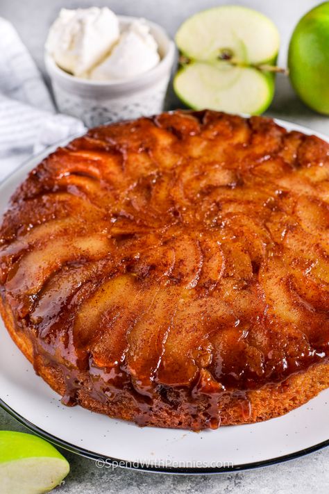 This recipe for apple cake is made in the style of an upside-down cake! Slices of cinnamon spiced apple are placed in the bottom of a pan with butter and brown sugar, then topped with a homemade yellow cake batter and baked until golden brown. Flip the pan and slip it off to reveal a layer of juicy, sticky, caramelized apples on top. The perfect dessert for apple-picking season! #applecakerecipeeasy #applecake #spendwithpennies #applecakerecipe #moistapplecakerecipes Brown Butter Apple Cake, Apple Upside Down Cake Easy, Recipe For Apple Cake, Unique Cake Flavors, Caramel Apple Upside Down Cake, Johnny Cakes Recipe, Apple Cake Recipe Easy, Homemade Yellow Cake, Apple Upside Down Cake