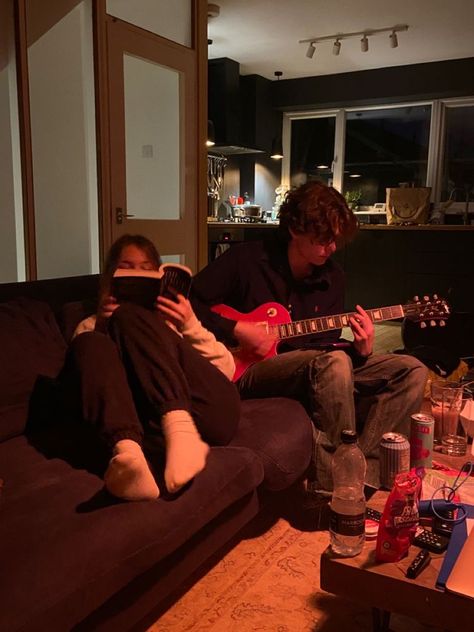 Two People, Guitar, Water