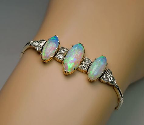 Antique Edwardian Opal Diamond Bracelet - Antique Jewelry | Vintage Rings | Faberge Eggs Antique Opal Jewelry, Bijoux Art Nouveau, Elongated Oval, Edwardian Jewelry, Antique Bracelets, Faberge Eggs, Tiffany Jewelry, Opal Bracelet, Diamond Bracelets