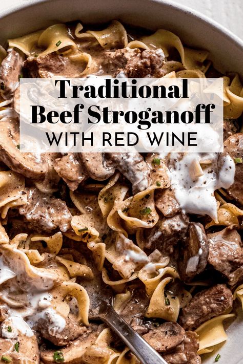 Traditional Beef Stroganoff features beef cubes slowly cooked in a rich gravy spiked with brandy and wine, and given a healthy dose of sour cream. Served over buttered noodles it's the ultimate comfort food dish. // stroganoff recipe // easy Authentic Beef Stroganoff Recipe, Stroganoff Recipe Easy, Recipe With Red Wine, Steak Stroganoff, Classic Beef Stroganoff Recipe, Traditional Beef Stroganoff, Homemade Beef Stroganoff, Best Beef Stroganoff, Beef Cubes