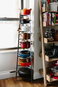 The Glorious Generosity of Carla Hall | Kitchn Under Counter Wall Ideas, Carla Hall, Pan Storage, Pot Rack Hanging, Wooden Shelf, Pot Rack, Pots And Pans, 인테리어 디자인, Storage Rack