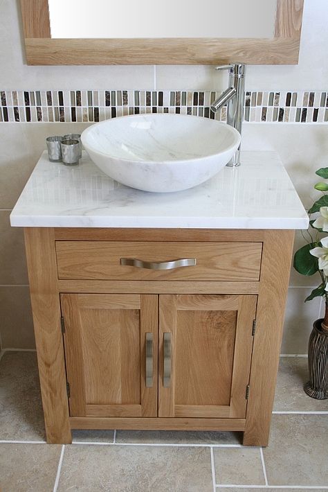 Delivery: 2-3 Working Days Next Day Delivery : Upgrade available upon checkout. This unit comes complete with: A beautiful marble bowl set. A stunning pre drilled white veined marble top. Bowl dimensions : H14cm X Diameter 43cm. This complete bathroom vanity unit has … Continue reading →