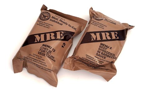 A stack of MRE meals arranged neatly on a shelf Mre Meals, Mexican Style Chicken, Maple Muffins, National Preparedness Month, Emergency Planning, Meal Ready To Eat, Toaster Pastry, Chicken Burrito Bowl, Chunky Peanut Butter