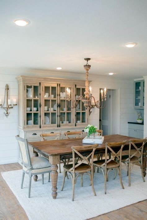 Different wood finishes in this dining room add texture without being too overwhelming, and this dining table can sit up to 8! HGTV Country House in a very Small Town, 20 Best Fixer Upper Rooms via A Blissful Nest Stile Joanna Gaines, Joanna Gaines Dining Room, Fixer Upper Dining Room, Mixed Dining Chairs, French Country Dining Room Decor, Dining Room Buffet Decor, French Country Dining Room, Farmhouse Dining Room Table, 2024 Kitchen