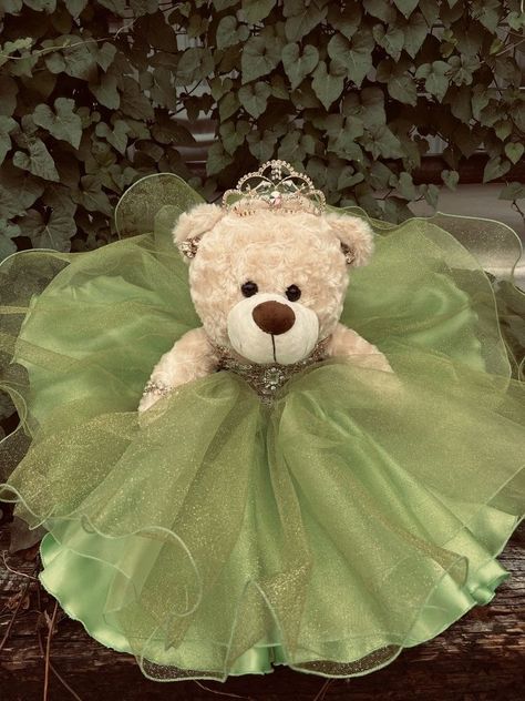 Mini Quinceañera Dress, Quinceanera Dresses Princess And The Frog, Quinceanera Bear Green, Sage Green Teddy Bear Quince, Light Green Quencinera Dresses, Sage Green Quinceanera Teddy Bear, The Princess And The Frog Quince, Fairy Quinceanera Theme Dresses, Princess Tiana Themed Quince