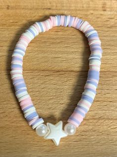 Trending Clay Bead Bracelets, Aesthetic Clay Bead Ideas, Cute Bracelet Ideas With Words, Princess Clay Bead Bracelet, Your Birth Month Your Clay Bead Bracelet, Clay Bead Bracelets With Charms, Pink Bracelets Ideas, Pastel Clay Bead Bracelet Ideas, Pink Clay Bracelet Ideas