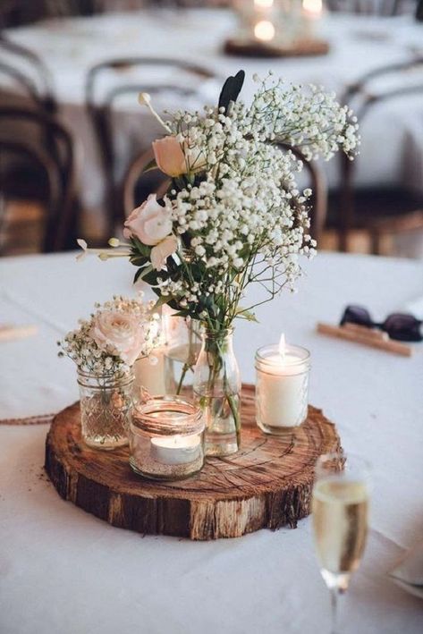 Old glasses + candles and wooden slice used for wedding centerpieces (from http://www.fabmood.com/unique-wedding-reception-ideas-budget-18/) Centerpieces Simple, Wedding Centrepiece, Unique Wedding Receptions, Rustic Wedding Decorations, Simple Decoration, Delicate Wedding, Rustic Wedding Centerpieces, Wedding Table Decorations, Wedding Centerpiece