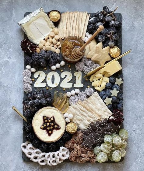 18 New Years Eve Charcuterie Board Ideas » Lady Decluttered Kids Charcuterie Board New Years, Nye Graze Board, New Years Grazing Board, New Years Eve Grazing Table, Nye Cheese Board, Nye Veggie Tray, Nye Platters, Black And Gold Charcuterie Board, New Years Charcuterie Board 2023