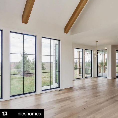 Windsor Windows on Instagram: “Can’t get enough of this incredible wall of Windsor Next Dimension painted black vinyl windows by @nieshomes. 😍😍😍 . . . #Repost @nieshomes…” Peak Windows Living Rooms, Open Floor Plan Large Windows, Windows That Go To The Floor, Large Home Windows, Big Windows Small House, Modern Windows Interior, Large Windows Back Of House, Great Room With Wall Of Windows, Great Room Large Windows