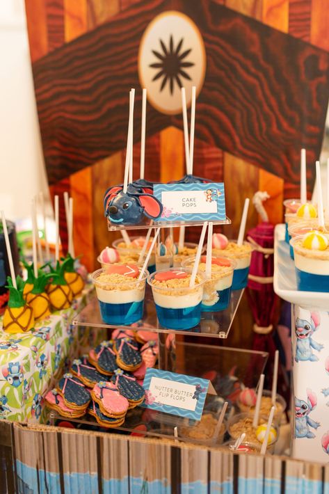 Stitch Birthday Party Ideas | Stitch Birthday Cake | Made It. Ate It. Loved It. Stitch 1st Birthday Party Ideas, Disney Stitch Party Food, Stitch Party Snacks, Stitch Charcuterie Board, Lilo And Stitch Charcuterie Board, Lilo Party Ideas, Stitch Fruit Tray, Stitch Theme Desserts, Hawaiian Stitch Birthday Party