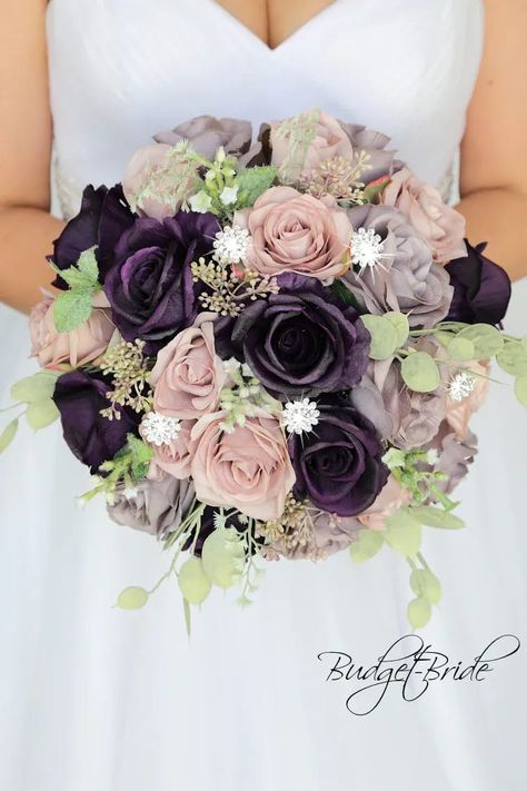 This is a round brides bouquet with plum, grey, and antique lavender roses accented with jewels. All of our wedding bouquets are made with artificial wedding flowers. Colored Wedding Flowers, Plum Wedding Flowers, Wedding Flowers Cheap, Round Bouquet, Plum Wedding, Malibu Wedding, Brides Bouquet, Purple Wedding Flowers, Perfect Bride