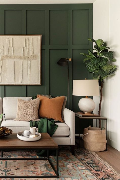 Olive Green Black And Brown Living Room, Cream Couch Green Walls, Gender Neutral Decor Living Room, Olive Green And Cognac Living Room, Moss Green Living Room Walls, Modern Living Room Earth Tones, Olive Grey Living Room, Moody Green Living Room Walls, Neutral Home With Colorful Accents