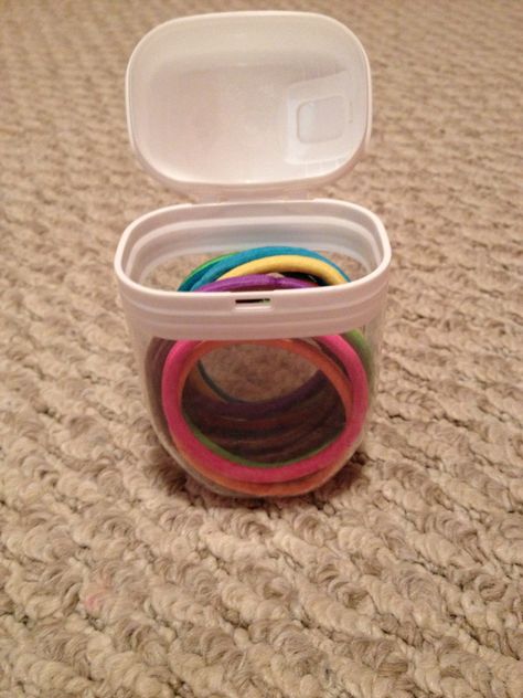 What a great use for empty large size TicTac containers- hairband storage!  Use more than one container to sort hairbands by size. Plastic Gum Container Crafts, Reuse Plastic Containers Creative Ideas, How To Reuse Plastic Gum Containers, Upcycle Plastic Containers Craft Ideas, Hairband Storage, Hair Band Storage, Repurpose Containers, Wipes Container Reuse, Upcycle Makeup Containers