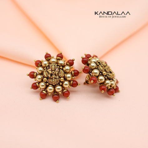 Captivating Lakshmi stud featuring vibrant coral and lustrous pearls, embodying serenity and divine elegance. Ear Rings For Mom Indian, Lakshmi Earrings Gold, Moti Jewellery Indian, Coral Earrings Gold Indian, Latest Gold Set Designs, Pagadam Jewellery, Coral Jewelry Indian Gold, Studs Earrings Gold India, Light Weight Gold Jewellery Indian