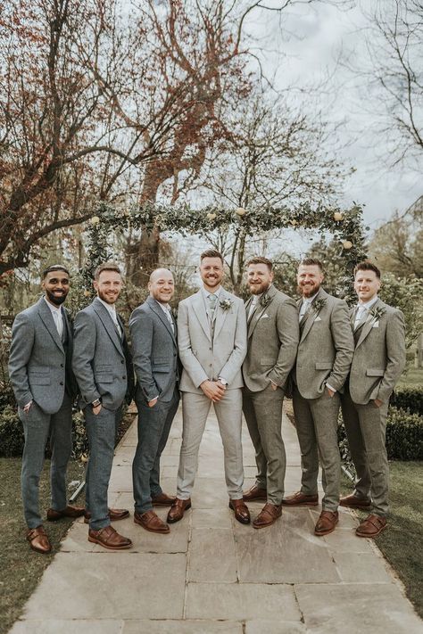 Groom in pale grey suit with mint green tie with groomsmen in blue suits and some in green suits with white flower buttonholes and brown shoes Suits For Summer Wedding, Groomsmen In Green, Wedding Flowers With Eucalyptus, Grey Wedding Suits, Brown Suit Wedding, Green Brown Wedding, Blue Grey Wedding, Flowers With Eucalyptus, Italian Style Wedding