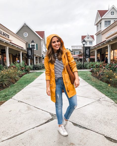 Navy and white striped tee+mustard yellow rainy jacket+skinny jeans+white sneakers+cognac tote bag. Fall Casual/ Weekday/ Rainy Days Outfit 2019 Yellow Jacket Outfit, Navy Dress Outfits, Mustard Jacket, Yellow Rain Jacket, Windbreaker Outfit, Yellow Windbreaker, Camel Blazer, Jacket Outfit Women, Yellow Raincoat