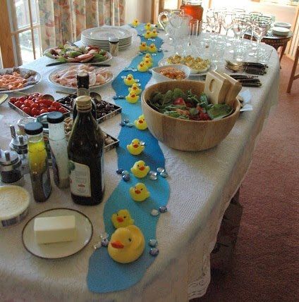 Duck baby shower table decor Duck Baby Shower Theme, Rubber Ducky Party, Rubber Ducky Birthday, Gender Neutral Baby Shower Themes, Ducky Baby Showers, Ducky Baby Shower, Rubber Ducky Baby Shower, Baby Shower Duck, Baby Shower Table Decorations