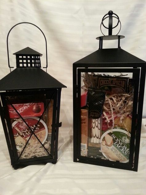 Beautiful Lantern Gift Baskets. Available @ K & M Delightz. Lantern Gift Basket, Christmas Corporate Gifts, Silent Auction Basket, Auction Gift Basket Ideas, Fundraiser Baskets, Silent Auction Baskets, Auction Basket, Homemade Gift Baskets, Raffle Basket