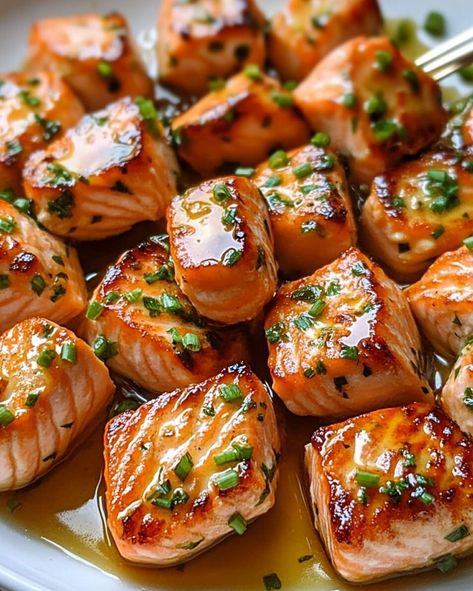 Honey Butter Garlic Glazed Salmon Bites - Recipessin Honey Butter Glazed Salmon Bites, Baked Salmon Appetizer, Sweet Salmon Glaze, Honey Butter Garlic Glazed Salmon Bites, Salmon Ideas For Dinner, Salmon Tapas, Blackened Salmon Bites, Glazed Salmon Recipes, Glazed Salmon Bites