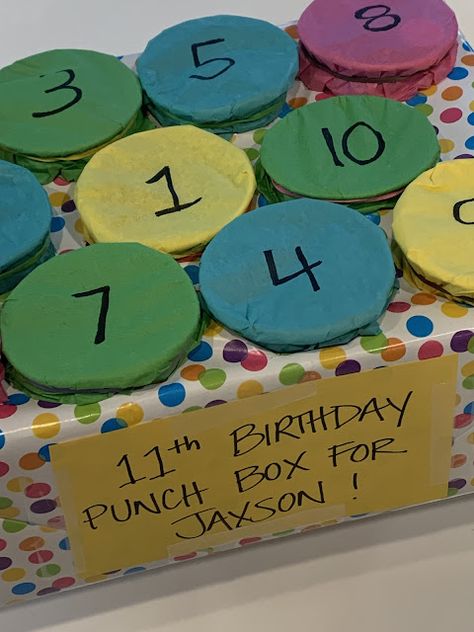 Easy to make punch board box @michellepaigeblogs.com Punch Hole Birthday Board, 18th Birthday Gifts With Money, 10 Days To Go Countdown Birthday Ideas, Punch Gift Ideas, Turning 11 Birthday Ideas, 12th Birthday Boy Ideas, How To Make A Punch Board With Cups, 10 Year Birthday Ideas, Punch Cup Birthday Gift Board