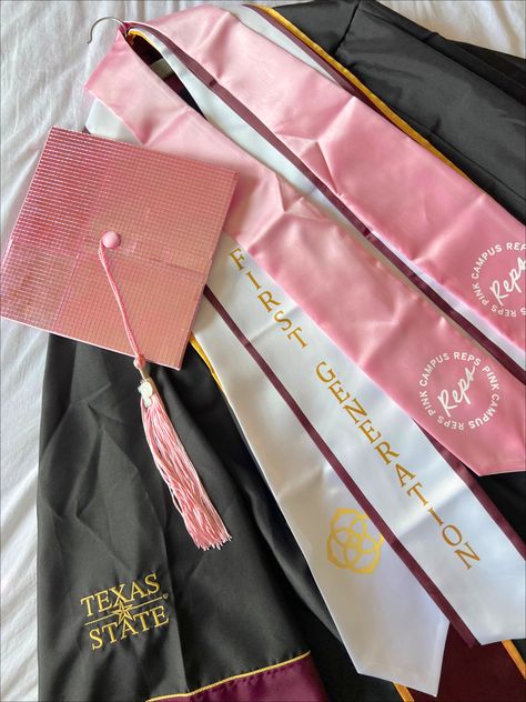 Pink Gown Graduation, Pink Graduate Aesthetic, Grad Gowns And Cap, Graudtion Caps Aesthetic, Texas State University Graduation Cap, Pink Graduation Stole, Pink Graduation Gown And Cap, Pink College Graduation Party, Cap And Gown Aesthetic