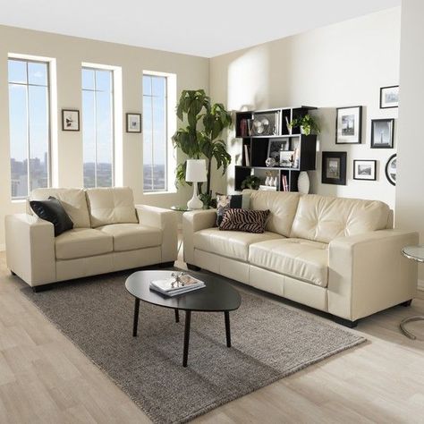 Baxton Studio Whitney Modern Ivory Faux Leather Sofa and Loveseat Set  ($1,189) ❤ liked Cream Leather Sofa Living Room, Leather Sofa Decor, Cream Sofa Living Room, White Sofa Set, White Leather Couch, Creme Sofa, Cream Leather Sofa, Contemporary Leather Sofa, Leather Sofa And Loveseat