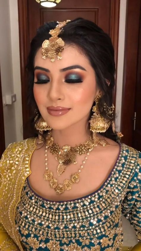 A colorful Mehndi look specifically concentrating on hooded eye makeup look. [Video] | Indian bride makeup, Latest bridal makeup, Bridal makeup images Bridal Makeup Ideas Indian, Non Bridal Makeup Indian, Haldi Mehendi Makeup Look, Sangeet Bridal Makeup Look, Dulhan Makeup Indian, Makeup By Parul Garg, Best Bridal Makeup Pakistani, Eye Makeup For Lehenga, Best Bridal Makeup Indian