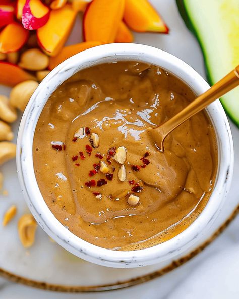 Best Thai Peanut Sauce: The Perfect Blend of Sweet, Savory, and Spicy If you’re a fan of Thai cuisine, you know that the magic often lies in the sauces. Thai ... Read more Tofu Peanut Noodles, Peanut Thai Sauce, Thai Peanut Tofu, Peanut Sauce Thai, Peanut Sauce Stir Fry, Satay Noodles, Spring Roll Sauce, Thai Peanut Noodles, Peanut Sauce Noodles