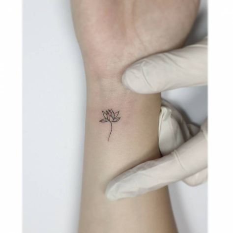 Lotus Tattoo Wrist, Lotus Flower Tattoo Wrist, Tiny Lotus Tattoo, Lotus Flower Tattoos, Playground Tattoo, Small Lotus Tattoo, Small Lotus Flower Tattoo, Small Rib Tattoos, Water Lily Tattoos