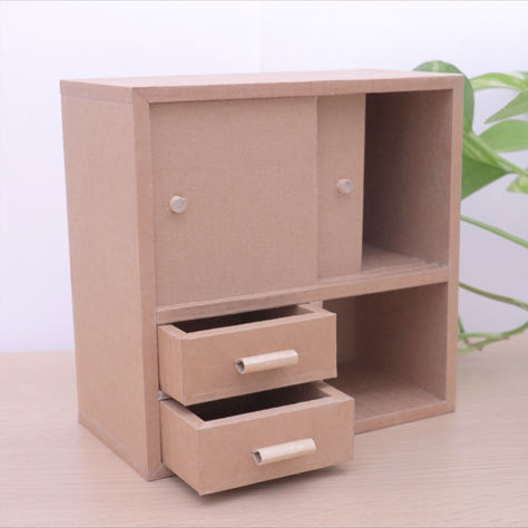 Hi, all cardboard DIY enthusiasts! In this video, I'll be showing you how to make a desktop cabinet from cardboard. Using simple materials and techniques, you can create a simple yet beautiful cabinet with drawers that's perfect for storing your favorite stationery and small items with STYLE. In previous videos, I've shown you how to make beautiful boxes and other storage solutions from cardboard, but in this video, the highlight is the sliding door threshold. Cardboard Vanity Diy, Cardboard Cabinet Diy, Cardboard Organizer Diy, Diy Box Storage, Cardboard Cabinet, Diy Cardboard Crafts, Cardboard Box Storage, Cardboard Drawers, Cardboard Box Diy