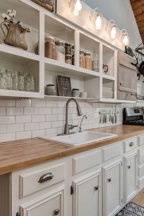 54+ White Cabinets With Butcher Block Countertops ( TIMELESS LOOK ) White Rustic Cabinets Kitchen, White Cabinet Kitchen Farmhouse Butcher Block Countertops, Taupe Kitchen Cabinets With Butcher Block, Kitchen Countertops Ideas White Cabinets, Butcher Block On White Cabinets, All White Kitchen With Butcher Block Countertops, Small White Farmhouse Kitchen, Butcher Block With White Cabinets, White Cabinets With Butcher Block Countertops