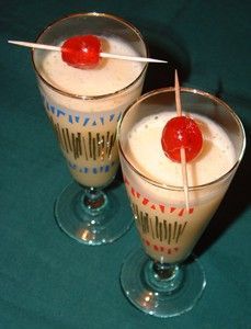 Retro style Christmas drinks  Snowball    Go retro this Christmas with this classic cocktail, the Snowball, which was popular in the 60s and 70s. Just mix advocaat, lemonade and a dash of lime cordial, whisk and serve in a tall glass with a cherry on a cocktail stick.    For a stronger drink try a shot of vodka for a Russian Snowball. Shot Of Vodka, Christmas Cocktail Party, Strong Drinks, Kitsch Christmas, Cocktail Sticks, Classic Cocktail, Retro Recipes, Christmas Cocktails, Christmas Past